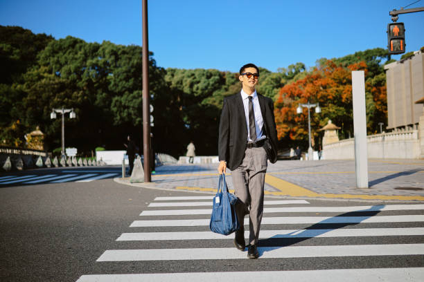 istock Stylish young businessman in Tokyo 2197689892