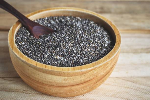 istock Chia seeds on brown wood background 2197692412
