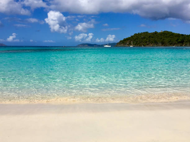istock Low angle Sand, tide crystal blue waters at Maho beach, St John, USVI 2197696456