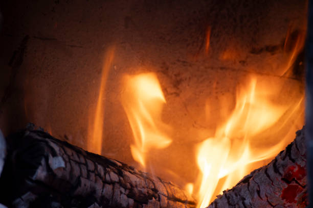 A burning flame with charcoals in the stove. High quality photo. Tsukuba district Ibaraki Japan 01.18.2025