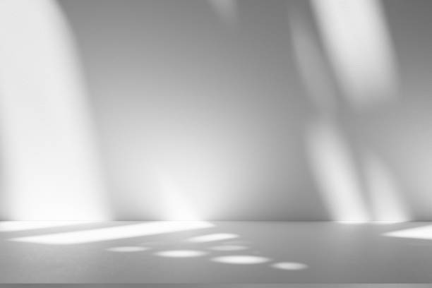 istock Wall interior background, studio and backdrops show products.with shadow from window color white . background for text insertion and presentation product 2197703255