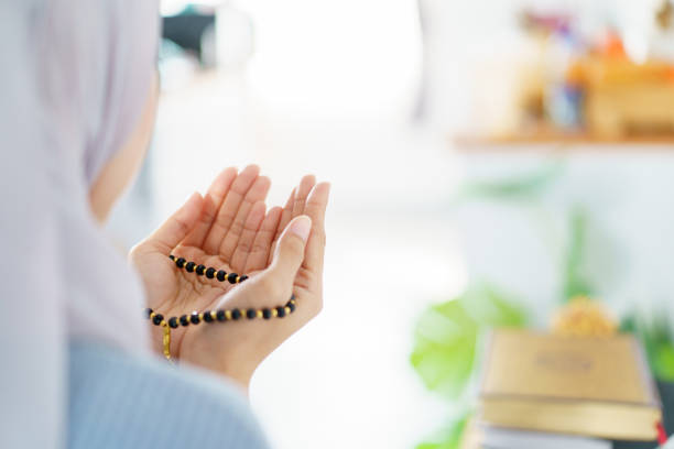 istock Asian muslim woman praying for Allah. 2197703988