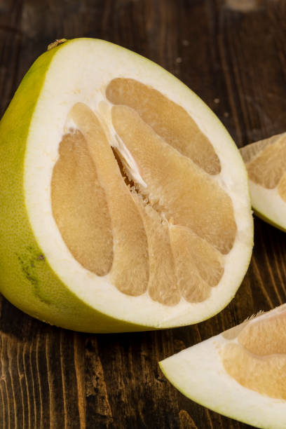 istock ripe pomelo with lots of pulp cut into pieces 2197705653