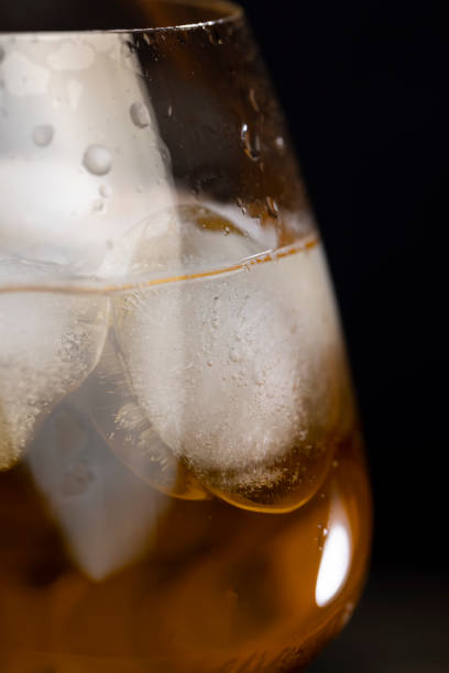 istock transparent glass with cold apple juice with ice 2197705779
