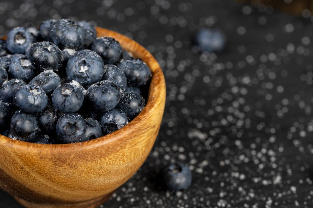 istock sprinkled with white sweet sugar juicy blueberry berries 2197705802