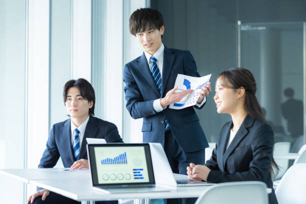 istock young businessmen having a meeting 2197706580