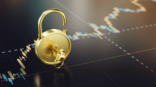 istock Open Golden Lock with a Key on Digital Display with Financial Graph Background 2197710258