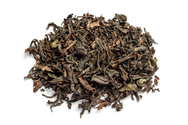 istock A pile of large-leaf black tea on a white background. 2197711733