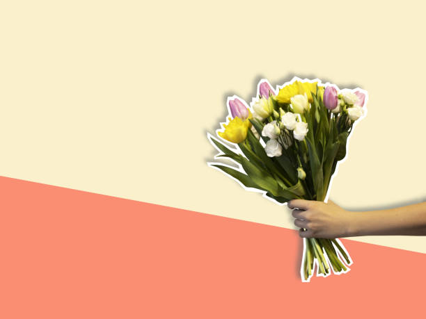 istock Creative collage of hand holding a flowers. 2197712701