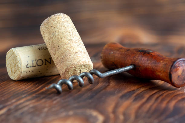 istock stopper, corkscrew on a wooden background 2197716137