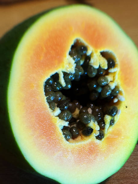 istock Fresh Ripe Papaya Cut in Half Showing Seeds 2197716187