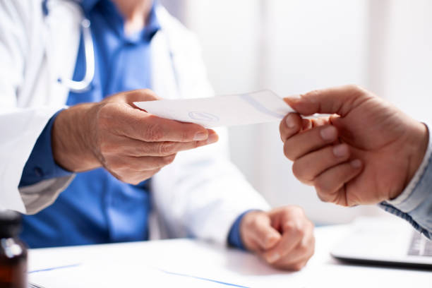 istock Caucasian people hold prescription paper 2197716672