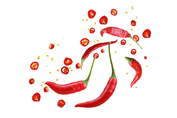 istock Spicy red chilies flying in air 2197717111
