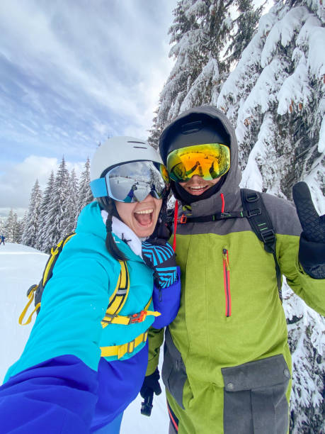 istock Skiers Taking Selfie on Snowy Mountain 2197717443