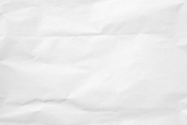 istock White recycled craft paper texture as background. Grey paper texture, Old vintage page or grunge vignette of old newspaper. Pattern rough art creased grunge letter. Hardboard with copy space for text. 2197720319