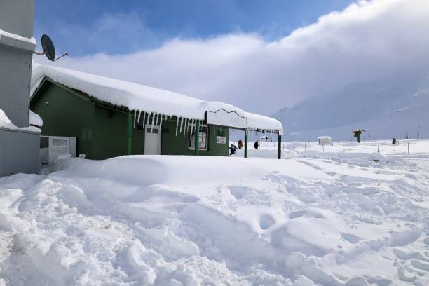 istock A building with snow on the ground 2197721348
