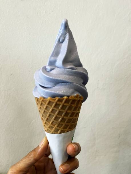 istock The woman's hand is holding an ice cream. 2197722419