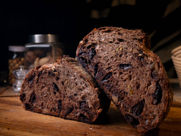 istock Freshly Baked Artisan Chocolate Sourdough Bread on Wooden Table. 2197724578