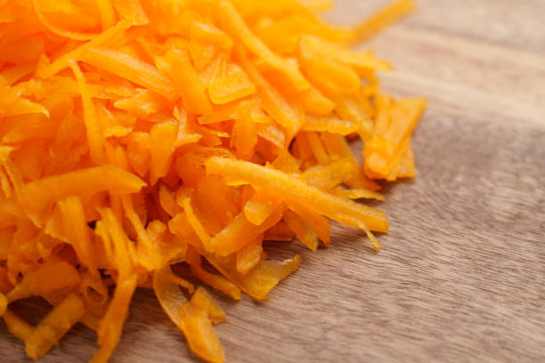 istock Grated shredded fresh organic pumpkin on a rustic board 2197732812