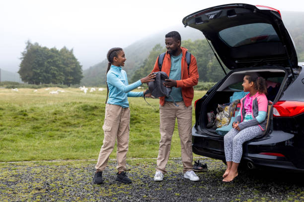 istock Family Checking Gear Before Heading Out on a Hike 2197733407