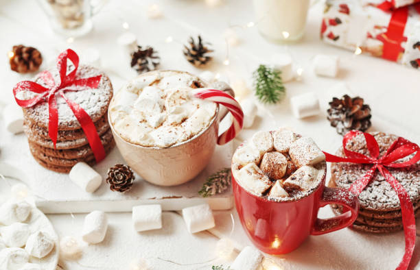istock Christmas cake and sweets on table. Christmas decorations with lights background. Happy New Year! Christmas greeting card. Winter card template. Xmas concept. Holiday Banner. Feast of Nativity. 2197735228