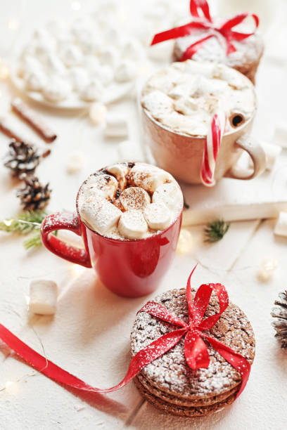 istock Christmas cake and sweets on table. Christmas decorations with lights background. Happy New Year! Christmas greeting card. Winter card template. Xmas concept. Holiday Banner. Feast of Nativity. 2197735335