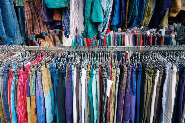 istock Clothes for sale in a flea market 2197736362
