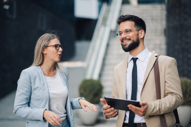istock Business people having conversation about work outdoors 2197738303