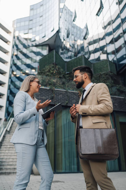 istock Business people having conversation about work outdoors 2197738318