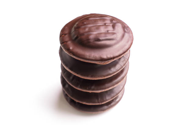 istock Overhead View of Stacked Chocolate Cookies on White Background 2197740333