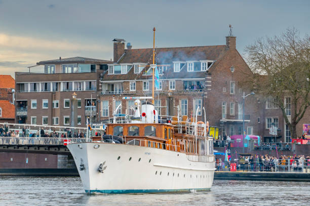 many ships parked near the shore in Amsterdam