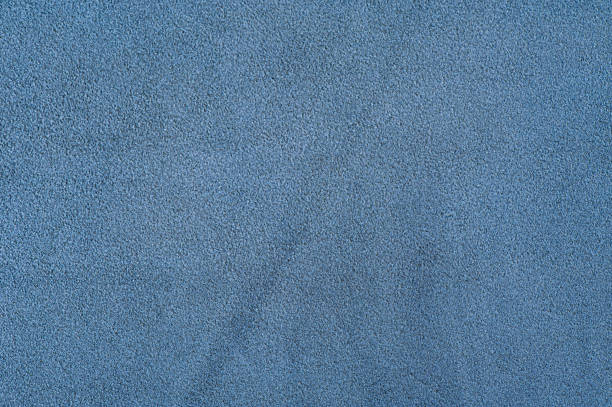 istock Blue suede. Texture of blue suede leather as a background. 2197744543