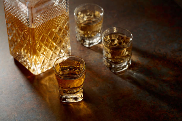 istock Decanter and small glasses of whiskey. 2197745573