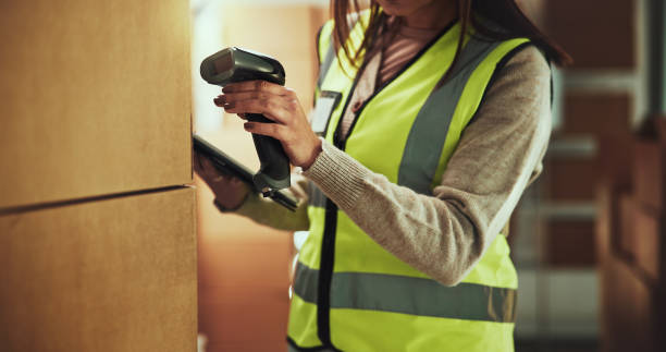 istock Hands, boxes and scan for inventory at warehouse with tablet, stock and check with supply chain job. Person, freight and touchscreen for checklist, app and package with distribution at shipping depot 2197745910