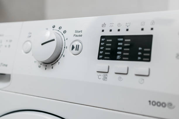 istock Close-up of washing machine buttons, ready for use. 2197747604