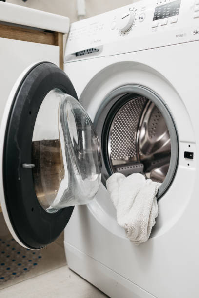 istock Laundry lies in the washing machine drum, ready for a wash. 2197747623