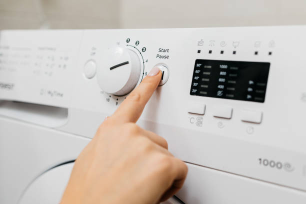 istock Close-up of washing machine buttons, ready for use. 2197747657