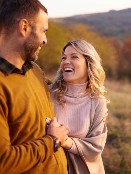 istock Happy couple in love talking during their time in nature. 2197751690