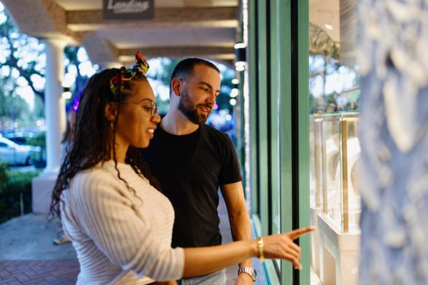 istock Beautiful couple doing window shopping 2197751759