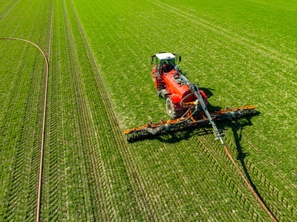 istock Tractor injecting livestock liquid manure in a field seen from above 2197752597