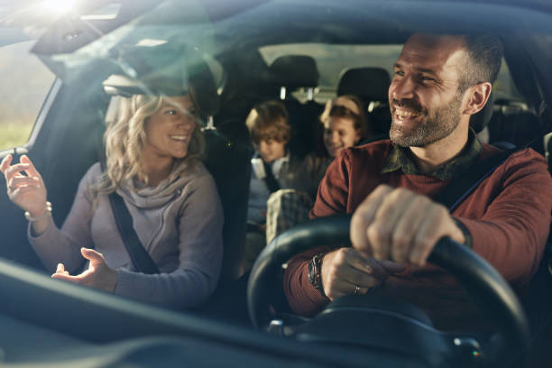 istock Happy family going on a road trip by car. 2197752868