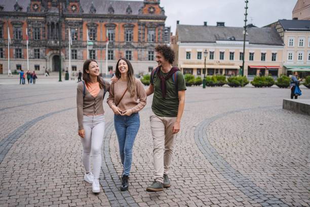 istock Tourists walking in stortorget square, malmo, sweden 2197753692