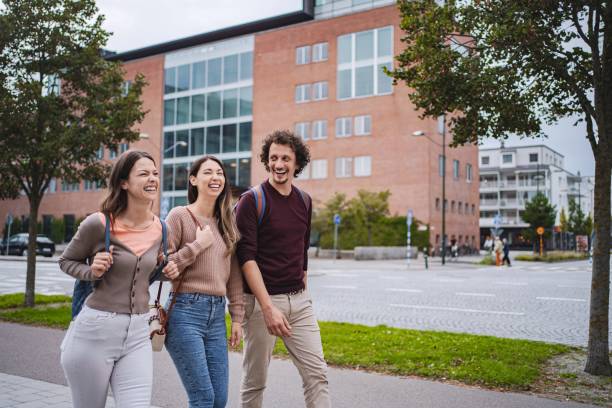 istock University students walking and talking in malmo, sweden 2197753743