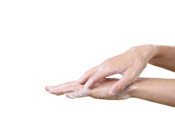 istock Woman washing hands with soap 2197754538