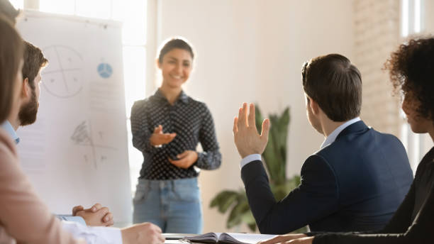 istock Business professional audience asking question to coach on presentation 2197755479