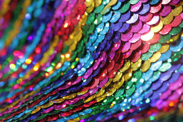 istock Colorful Rainbow Sequin Fabric Closeup 2197755614