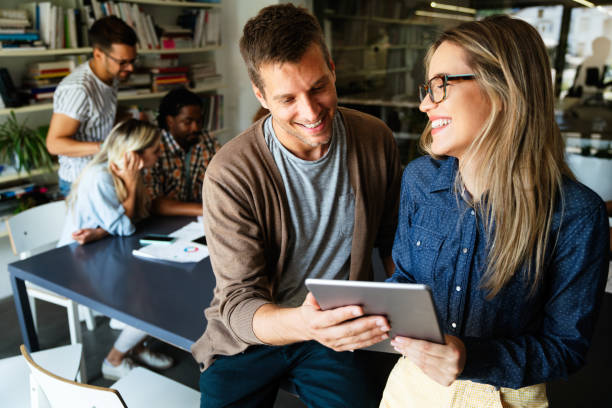 istock Successful multiethnic group of designers, architects, business people at work in office 2197758343