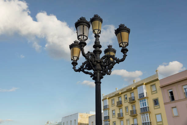 ornate art deco black Cast iron street lights in the Spanish city of Cadiz.