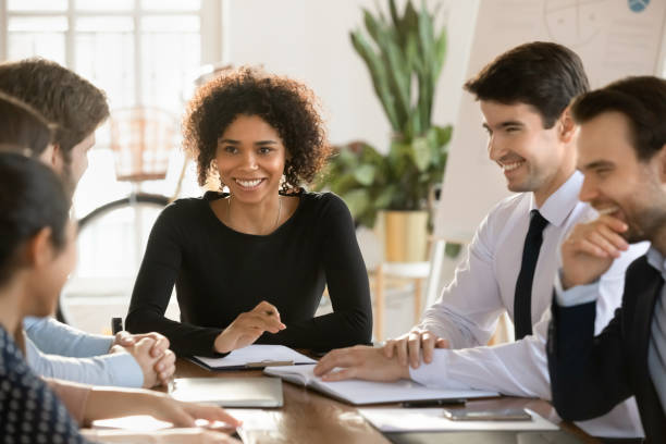 istock Happy young diverse business professional team having fun on meeting 2197759429