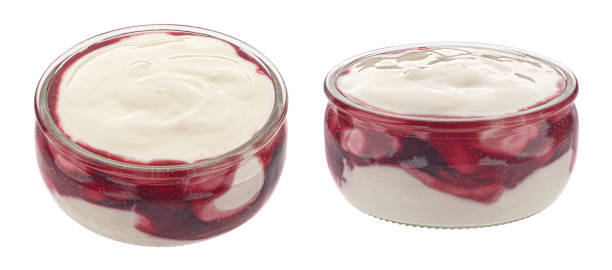 istock Berry layered yogurt with jam isolated on white background 2197760361